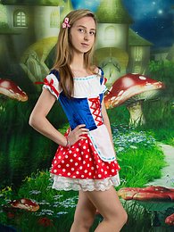 CrocoBabes presents: Very hot blonde teen beauty in an adorable outfit slowly takes it off to reveal her nice and perky boobs
