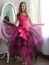 CrocoBabes presents: Gorgeous teen cutie stripping an evening dress and showing body in front of a big mirror.
