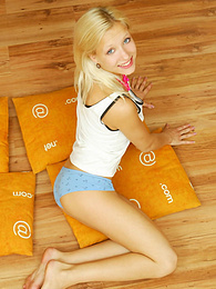 CrocoBabes presents: Amazing blonde nude teen decided to place herself at the attic of her wooden house on four orange pillows for her dirty intention.