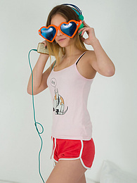 CrocoBabes presents: This doll really knows how to have fun with her and how she can show off her pussy and listen to some beats at the same time.